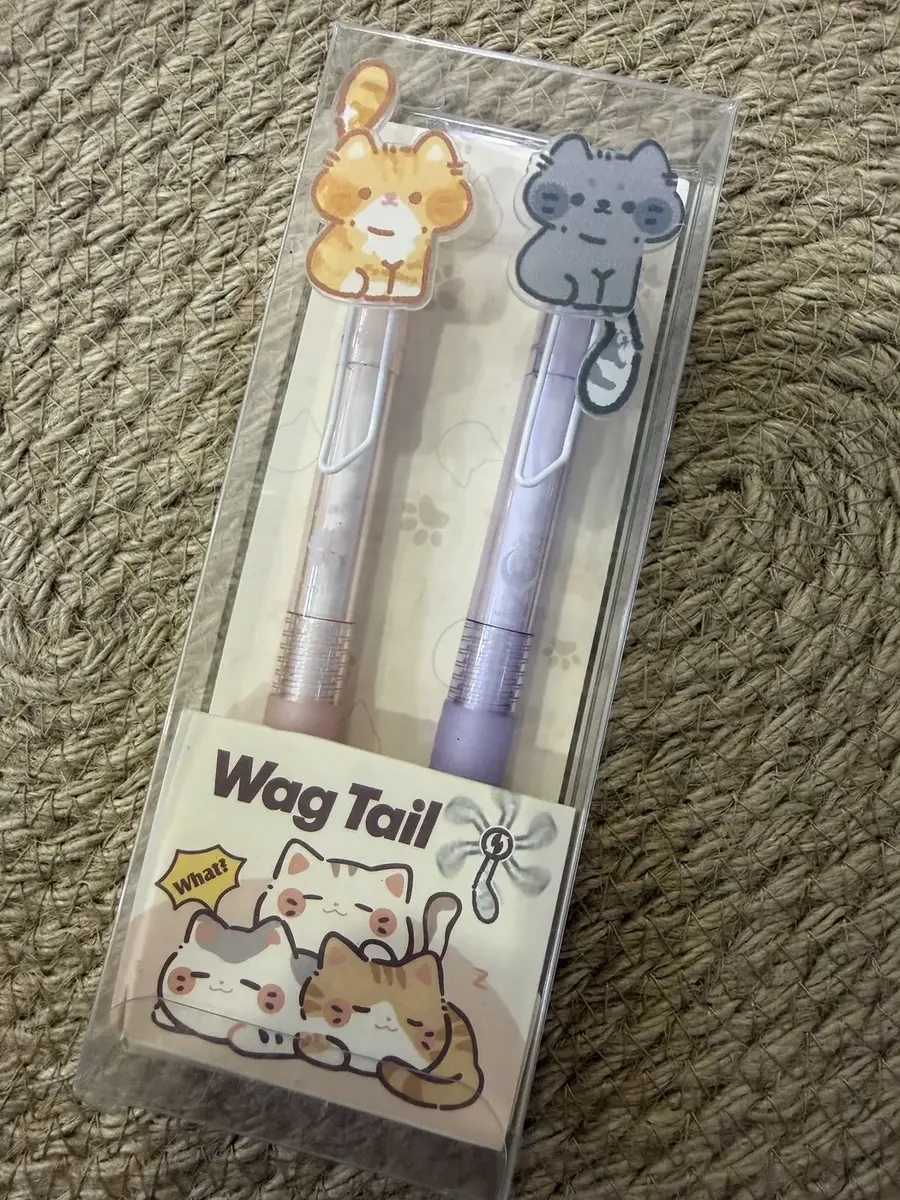 A Wag Tail cat pen set, with two pens.