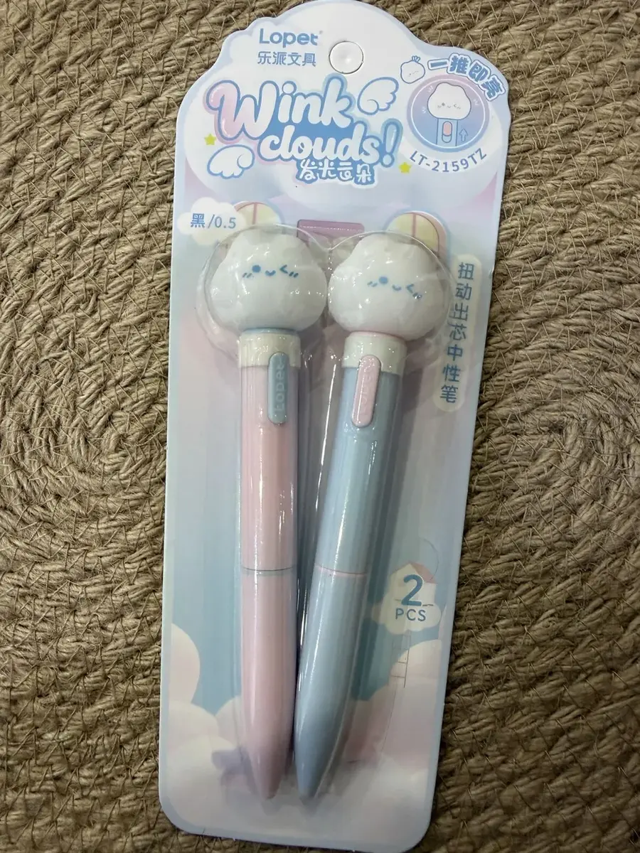 Two Wink Clouds pens on a card.